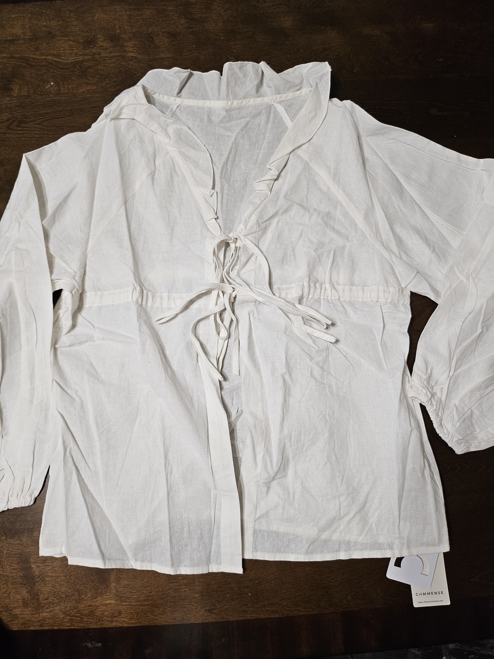 White Women's Top with Tag Detail